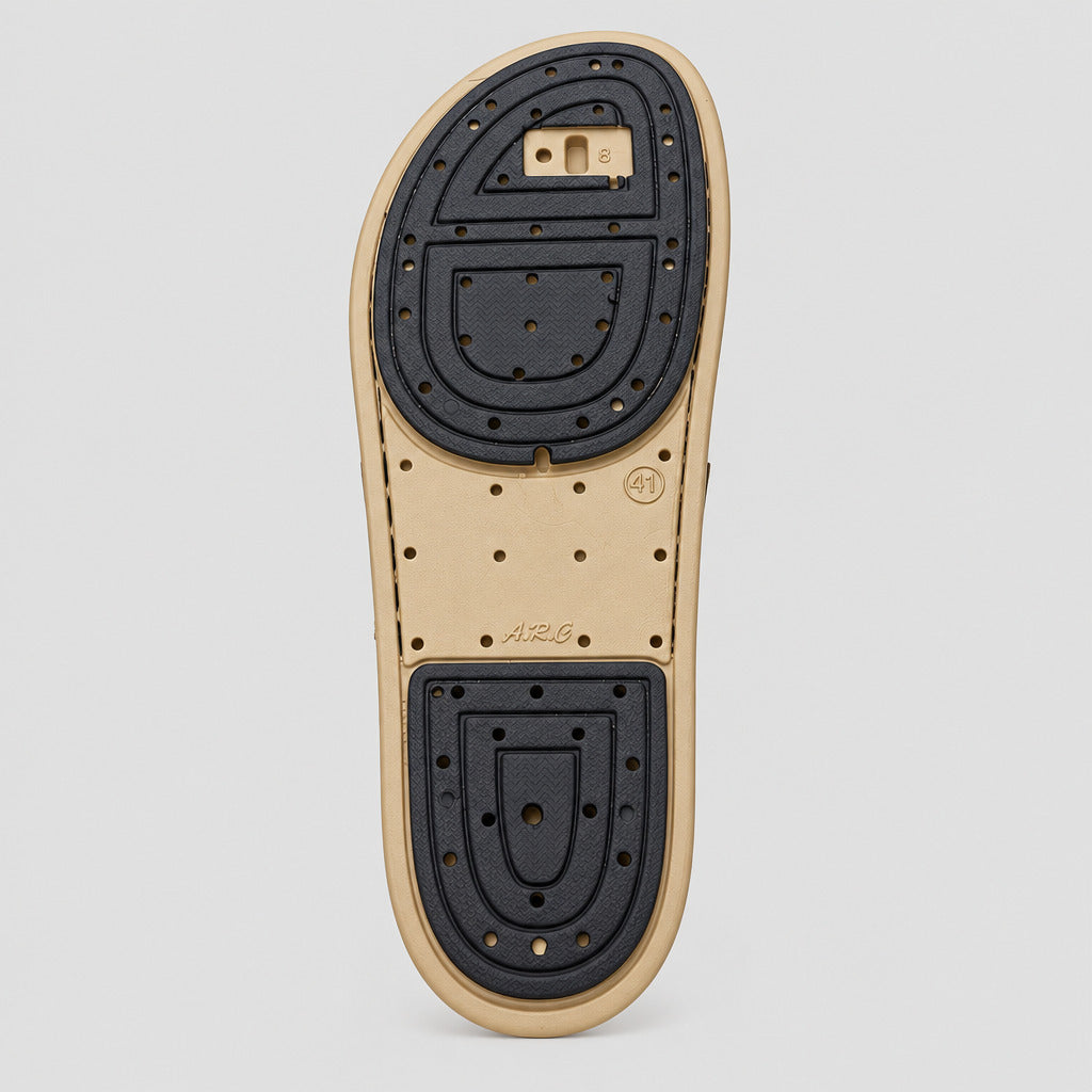 The outsole of a beige and black shoe, showing the ARF brand name and tread pattern, photographed on a light-colored marble floor.